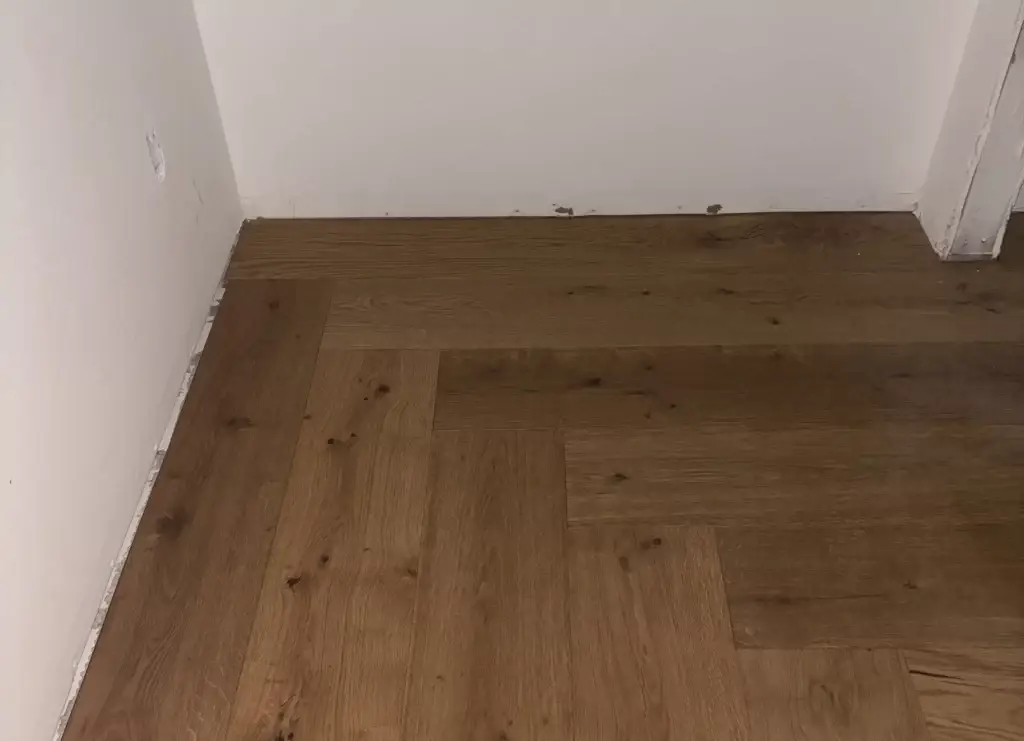 Do you have to remove baseboards to install vinyl flooring